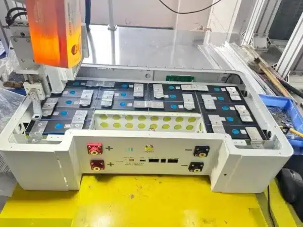Automated laser welding of LiFePO4 cells during 5kWh stackable battery storage assembly.
