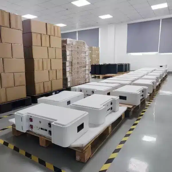 Bulk stock of 5kWh stackable battery storage units ready for global DDP shipping.